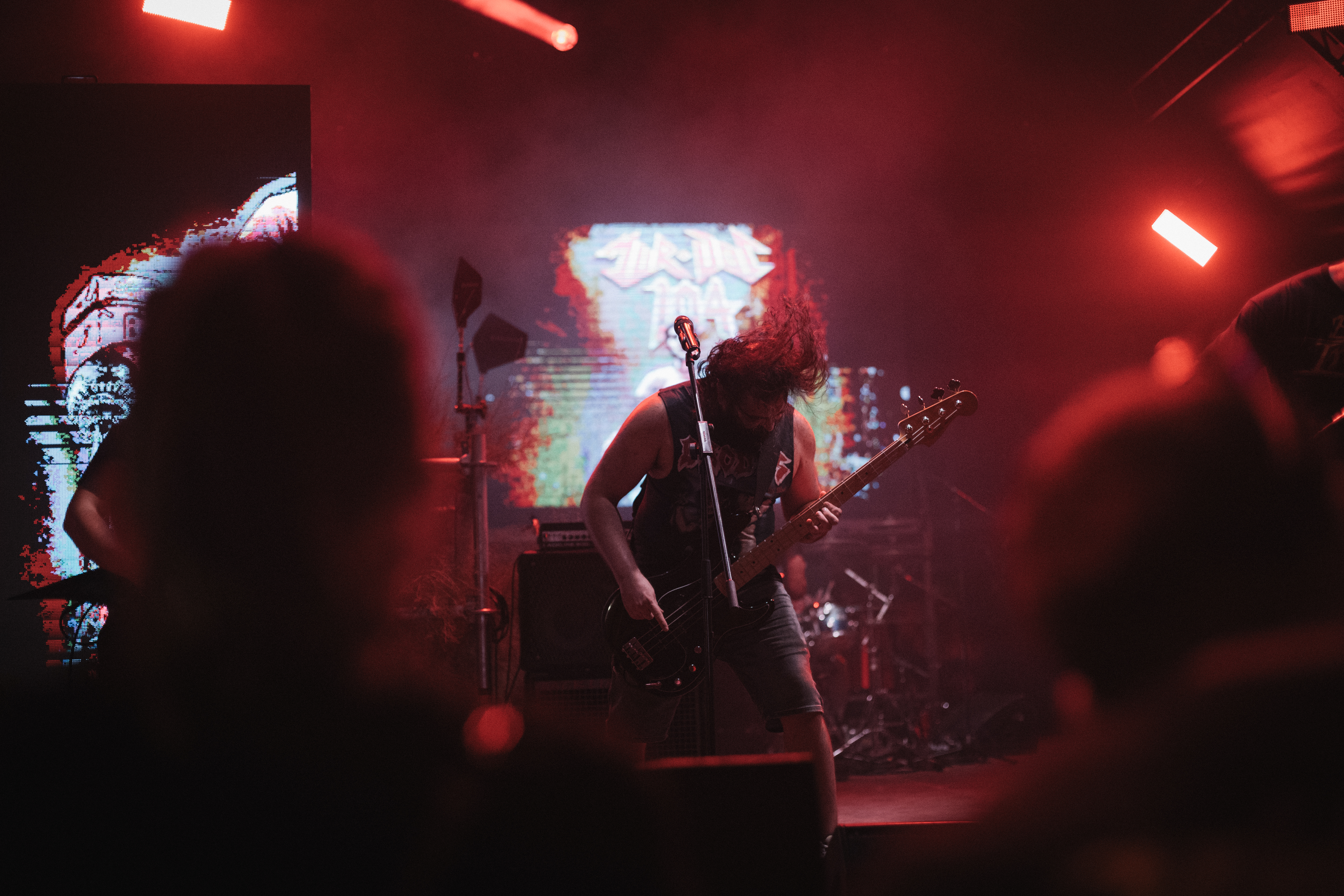 Mur.Doc 104 bassist on stage